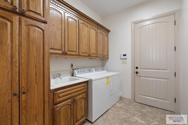 5713 Spicewood, Harlingen, TX 78552 - laundry room featuring cabinet space, washing machine and dryer, and light tile patterned floors