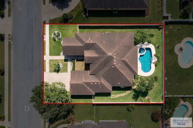 5713 Spicewood, Harlingen, TX 78552 - aerial view of property's location with a pool area and property boundaries highlighted