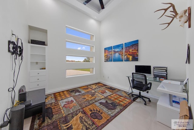 office featuring a high ceiling