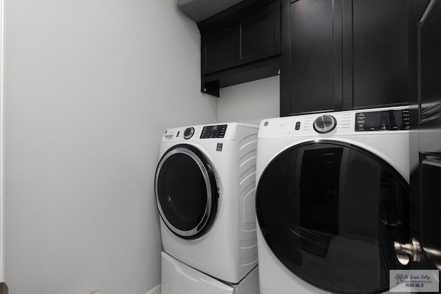 711 Santa Elena St, Weslaco, TX 78596 - laundry room featuring independent washer and dryer and cabinet space
