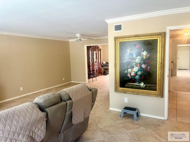 tiled living room featuring ceiling fan and ornamental molding