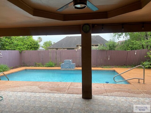 2776 Fleet St, Brownsville, TX 78521 - view of swimming pool with a ceiling fan and a fenced backyard