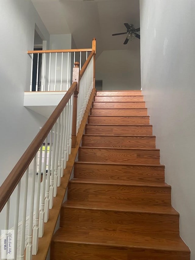 2776 Fleet St, Brownsville, TX 78521 - stairway featuring a ceiling fan, wood finished floors, and high vaulted ceiling