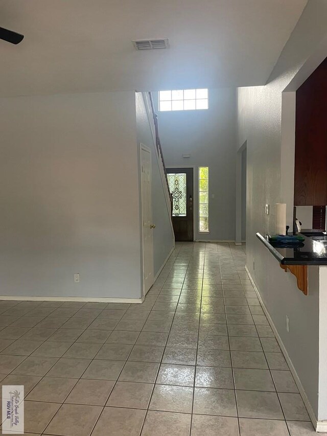 2776 Fleet St, Brownsville, TX 78521 - entryway featuring light tile patterned flooring and baseboards