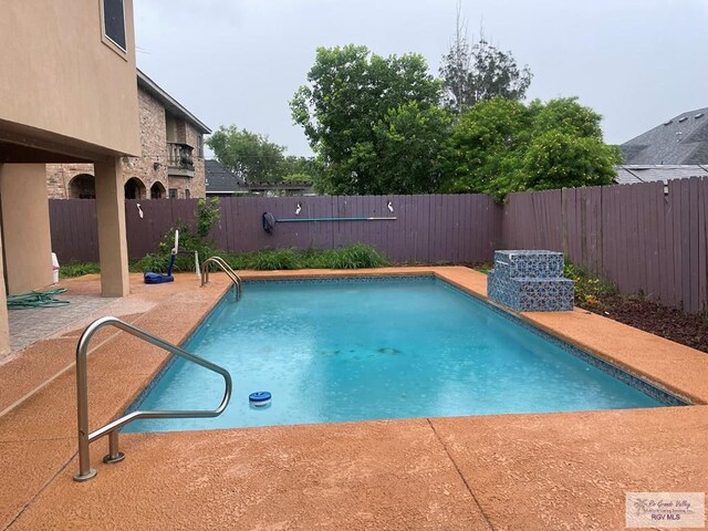 2776 Fleet St, Brownsville, TX 78521 - view of swimming pool featuring a fenced backyard and a patio
