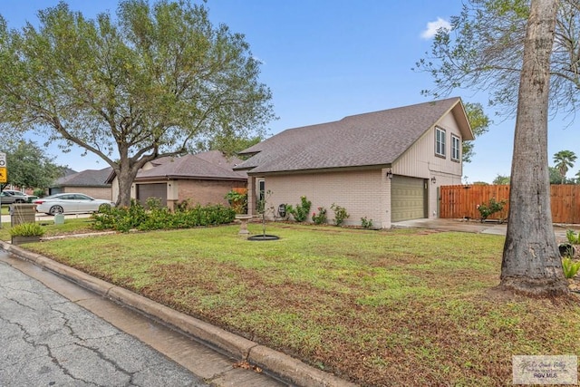 front facade with a garage and a front lawn