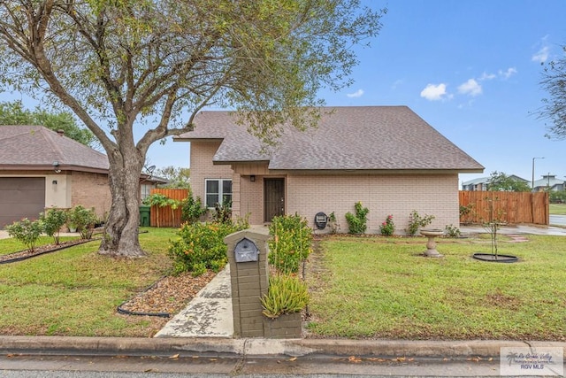 ranch-style house featuring a front lawn