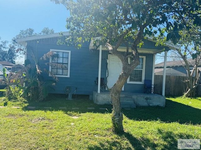 1400 Milpa Verde, Brownsville, TX 78521 - view of front of home featuring a front yard and fence