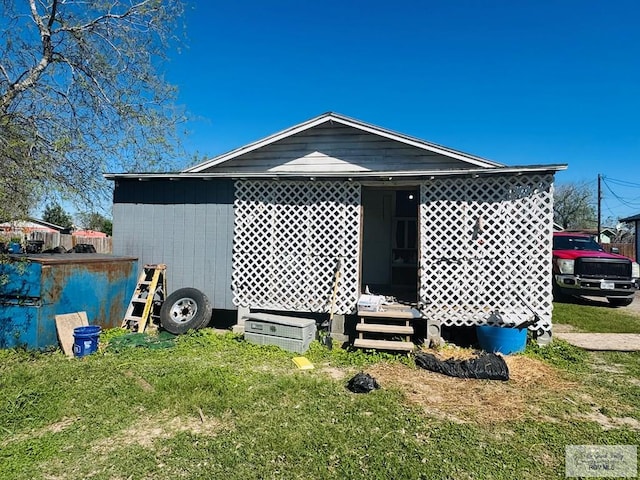 1400 Milpa Verde, Brownsville, TX 78521 - rear view of property featuring a yard