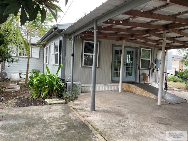 view of patio / terrace with ac unit and central air condition unit