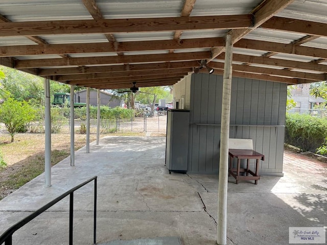 view of patio featuring ceiling fan