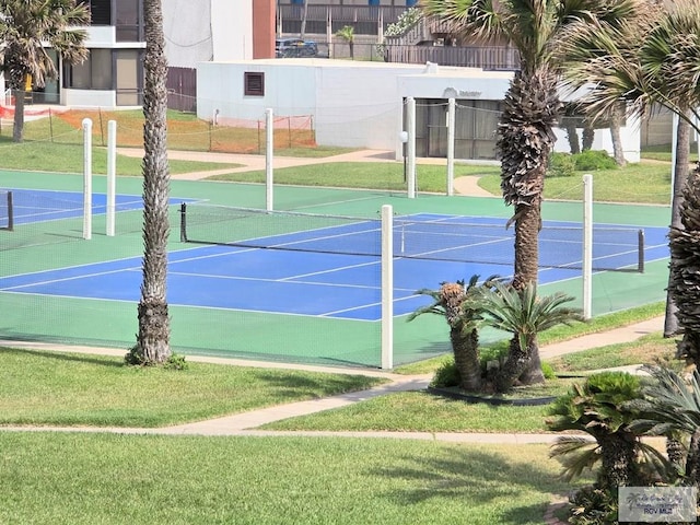 view of sport court with fence