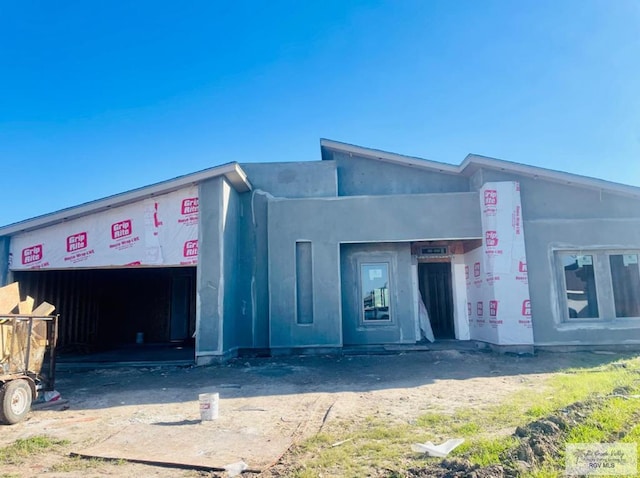 view of building exterior with a garage