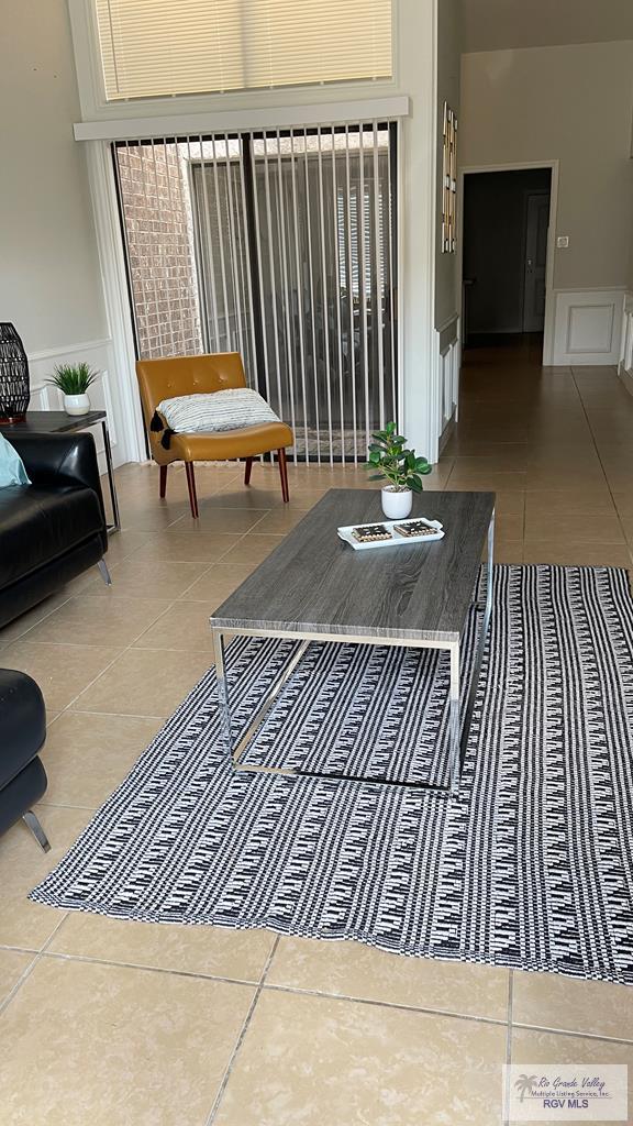 living room featuring tile patterned flooring