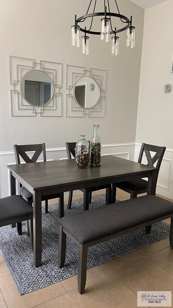 dining area with light tile patterned flooring