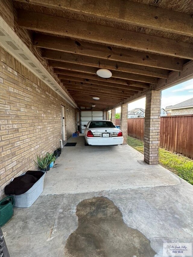 view of parking with a carport