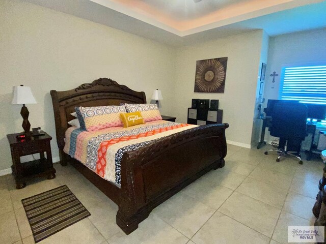 116 Village E Dr, Los Fresnos, TX 78566 - bedroom featuring tile patterned floors and baseboards