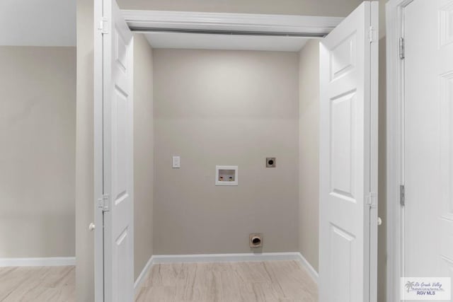 washroom featuring hookup for a washing machine and electric dryer hookup