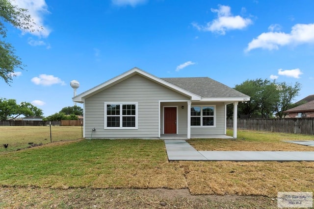 view of front of property with a front lawn