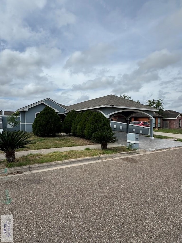 view of front of house featuring driveway and an attached garage