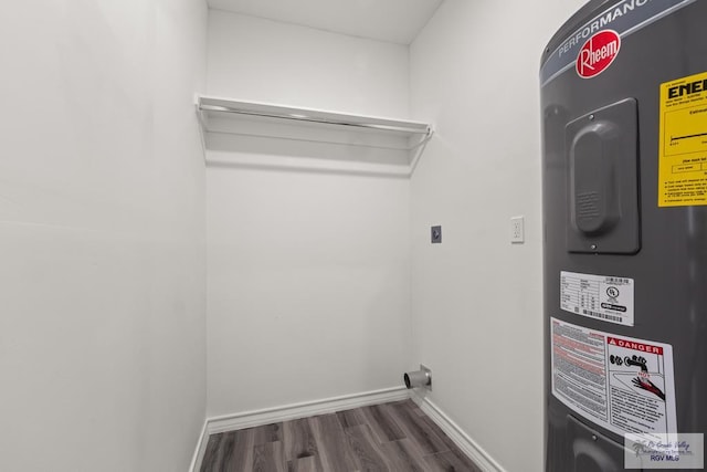 laundry room with water heater, hookup for an electric dryer, baseboards, and dark wood-style flooring