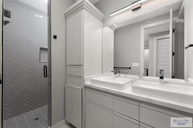 bathroom with vanity and walk in shower