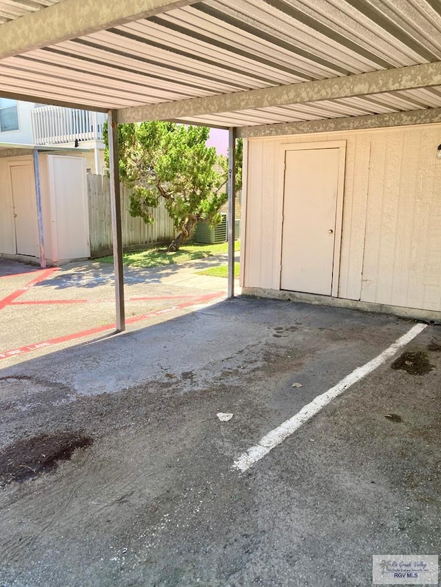 garage with a carport