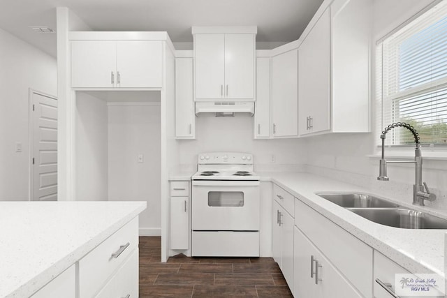 kitchen with white cabinets, white range with electric cooktop, dark wood-type flooring, and sink