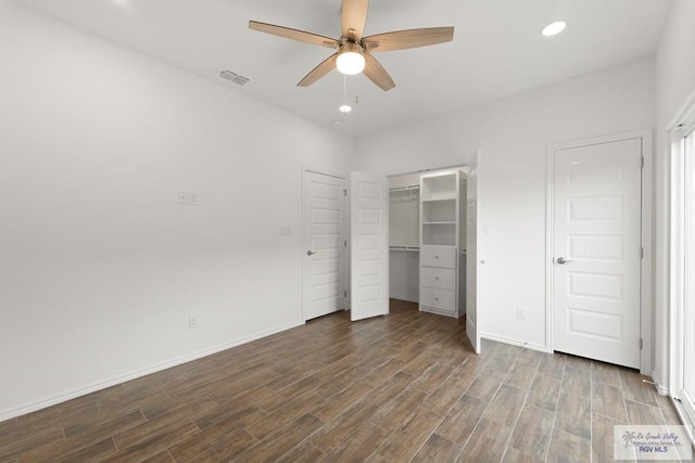 unfurnished bedroom featuring hardwood / wood-style flooring and ceiling fan