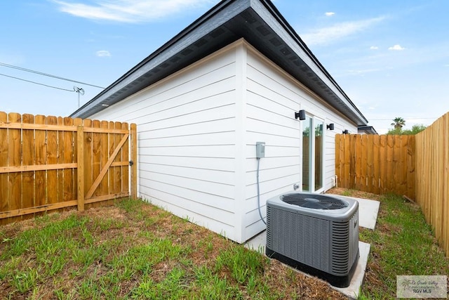 view of outbuilding featuring cooling unit