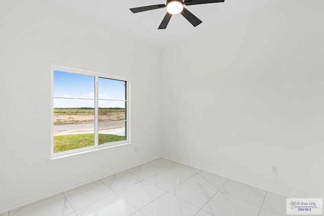 unfurnished room with ceiling fan