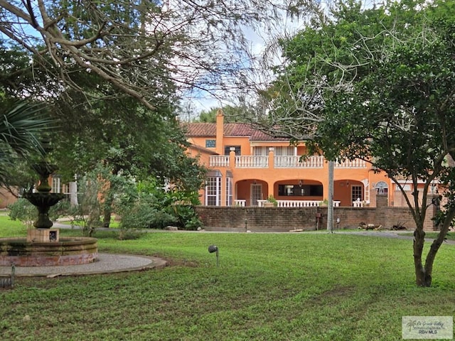 exterior space featuring a balcony