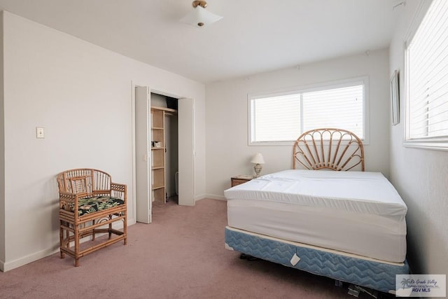 109 E Pompano St, South Padre Island, TX 78597 - bedroom with light colored carpet and baseboards