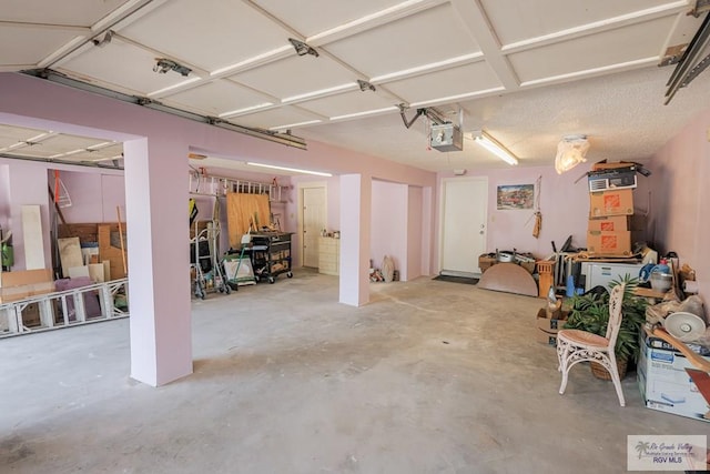 109 E Pompano St, South Padre Island, TX 78597 - garage featuring a garage door opener