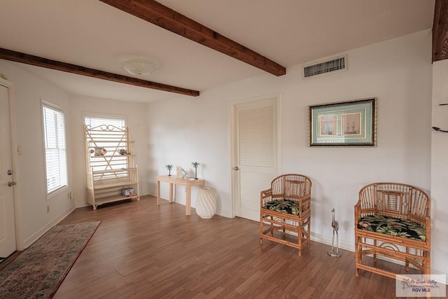 109 E Pompano St, South Padre Island, TX 78597 - sitting room with wood finished floors and beam ceiling