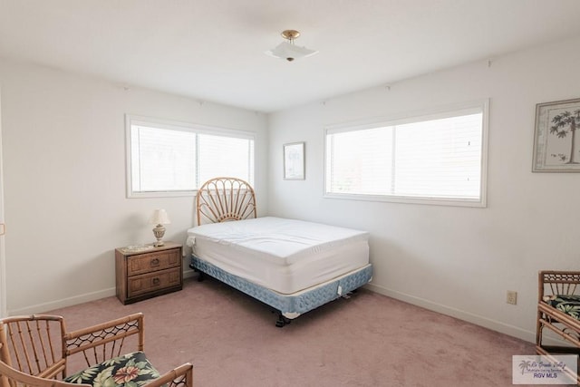 109 E Pompano St, South Padre Island, TX 78597 - bedroom featuring light colored carpet