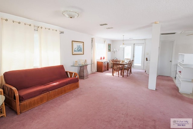 109 E Pompano St, South Padre Island, TX 78597 - living room with light colored carpet
