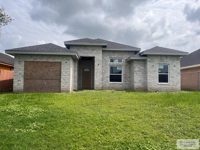 6692 Los Lobos Dr, Brownsville, TX 78521 - prairie-style house with roof with shingles and an attached garage