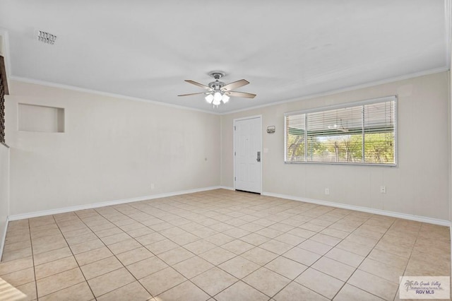 unfurnished room featuring crown molding, visible vents, baseboards, and ceiling fan