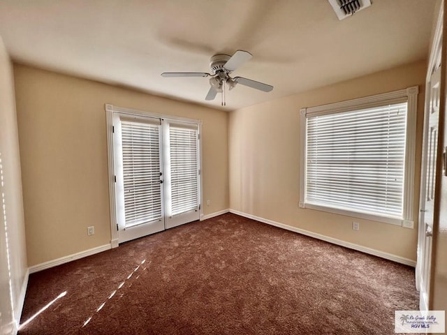 144 Country Club Rd Unit 1, Brownsville, TX 78520 - empty room with a ceiling fan, visible vents, carpet floors, french doors, and baseboards