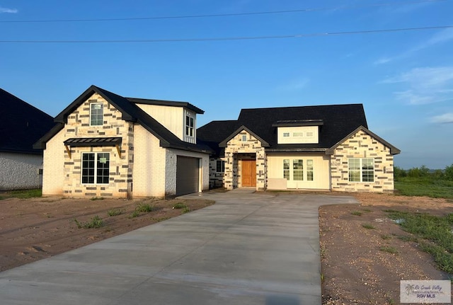 view of front of home with a garage