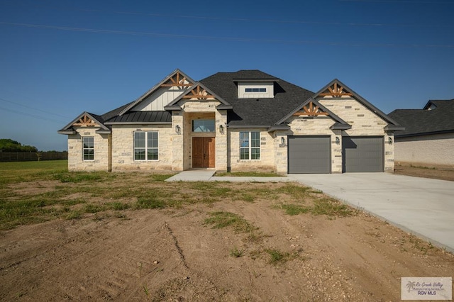 view of front of property featuring a garage