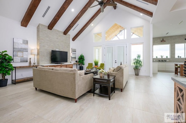 living room with beamed ceiling, high vaulted ceiling, and ceiling fan