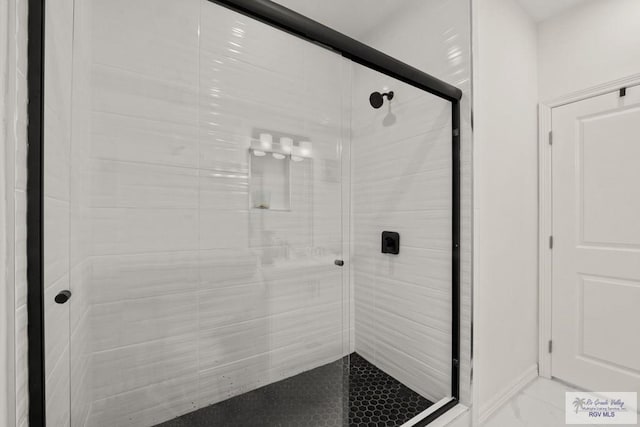 bathroom featuring walk in shower