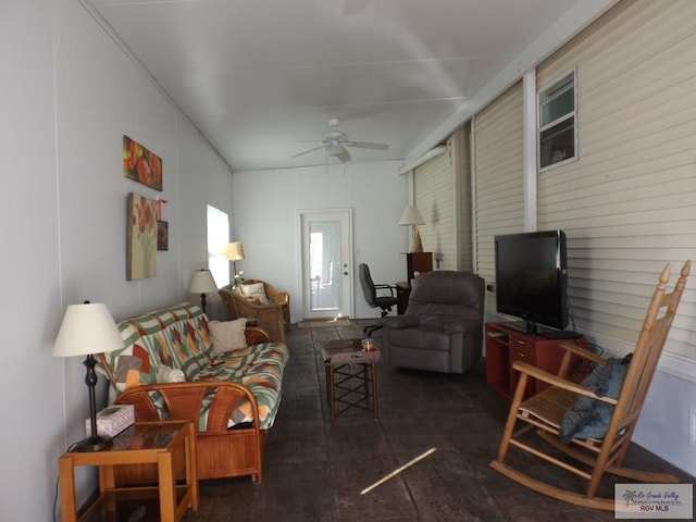 living room featuring ceiling fan