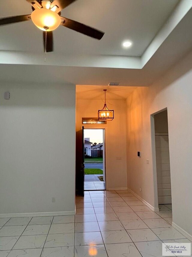 entryway with ceiling fan