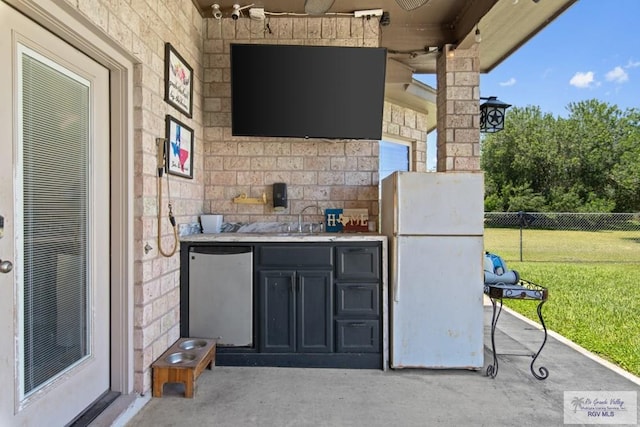 34164 Quail Dr, San Benito, TX 78586 - view of patio / terrace featuring a bar