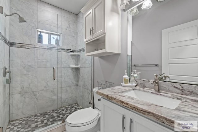 34164 Quail Dr, San Benito, TX 78586 - bathroom with toilet, a shower stall, and vanity