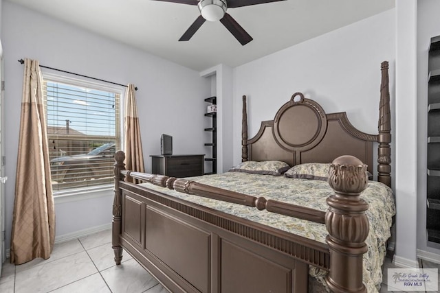 34164 Quail Dr, San Benito, TX 78586 - bedroom with ceiling fan and baseboards