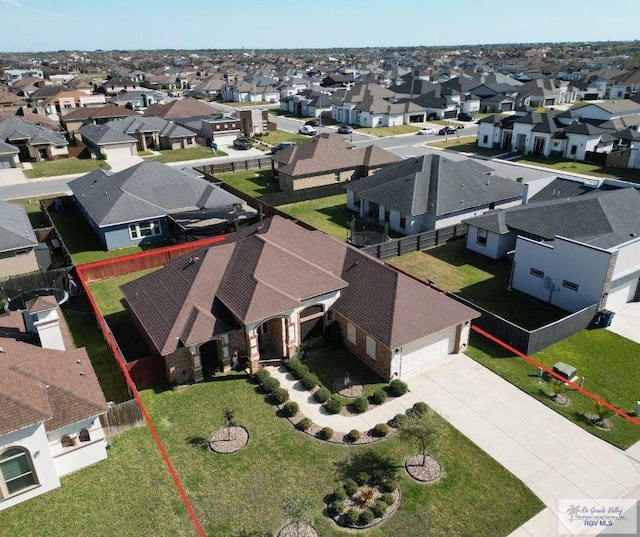 birds eye view of property with a residential view